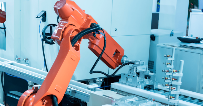 brazo robótico con herramienta EOAT en linea e producción